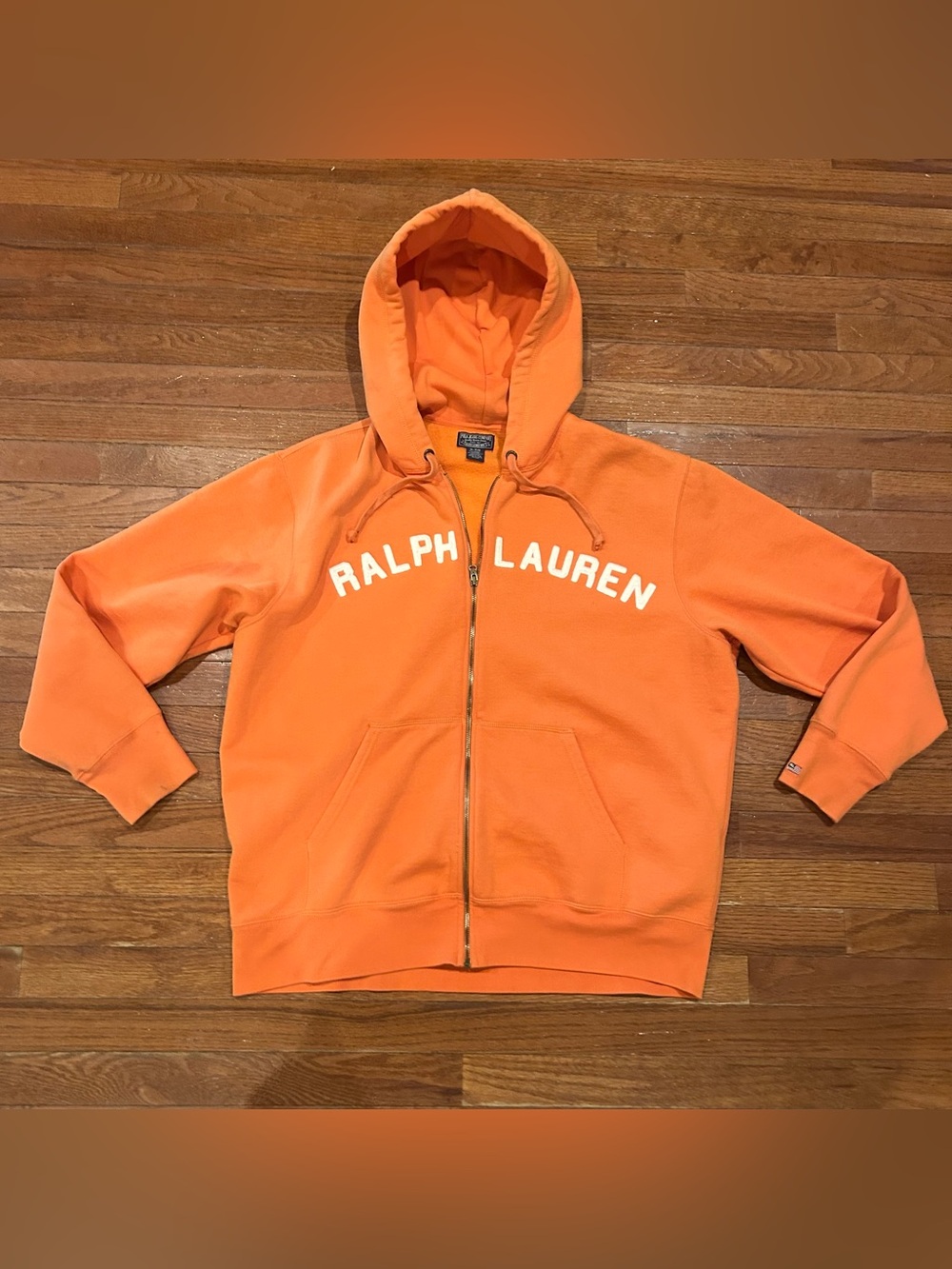 Polo Ralph Lauren full-zip hoodie with white text branding across the chest.